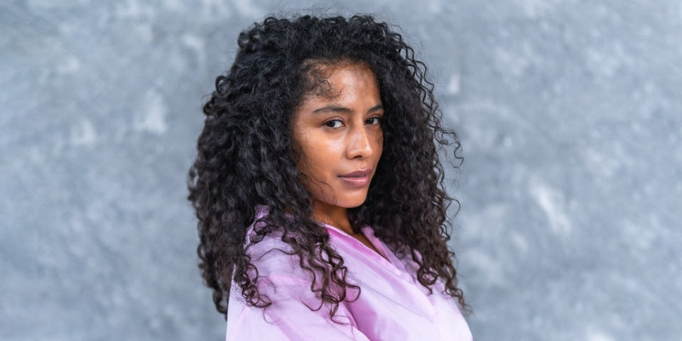 How to Tame Frizzy Curly Hair: Anti-Frizz Tips & Products